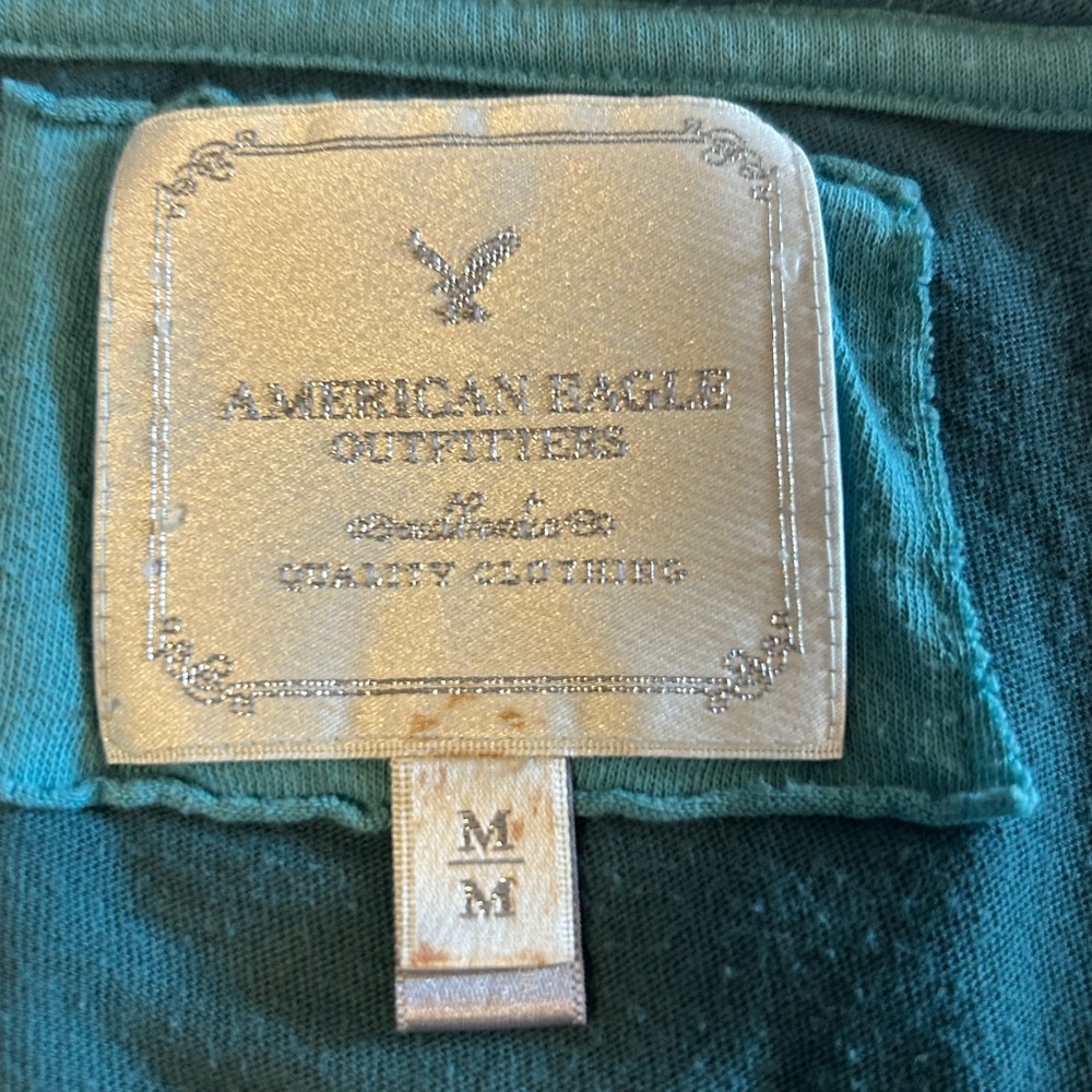 FREE with purchase of any other nondiscounted item: American Eagle Teal Top Sz M